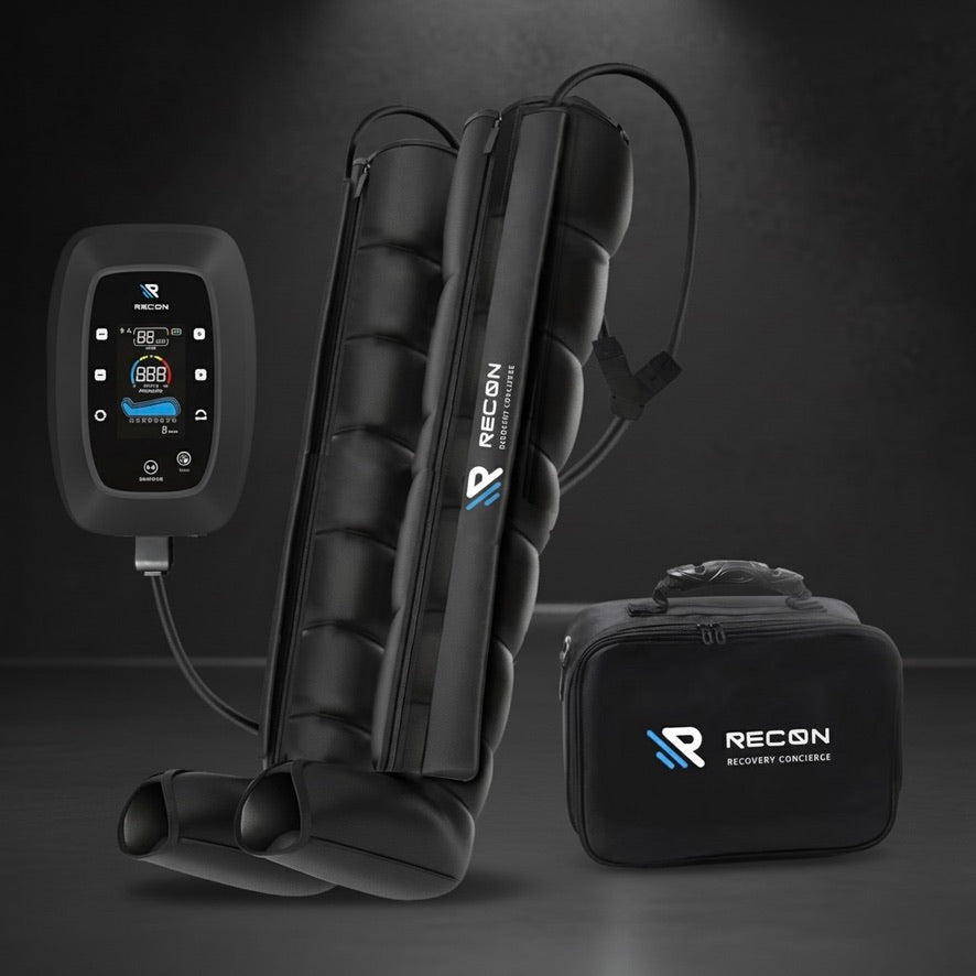 RECON Elite Compression System 8-chamber boots on an athlete's legs