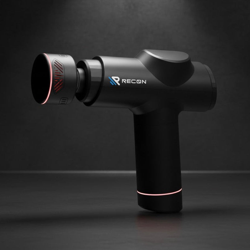 Black massage gun with 'RECON' branding on a dark background