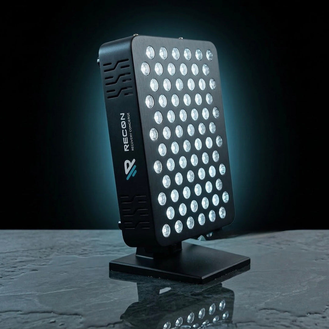 Red light therapy device with visible brand logo on a dark background